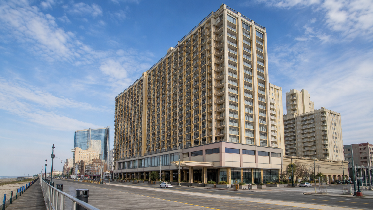 Unbranded Atlantic City high-rise resort exterior near a coastal boardwalk setting
